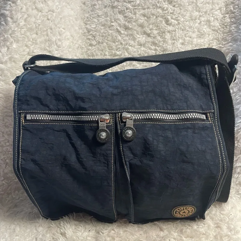 Kipling Nylon Expandable Navy Blue Large Messenger Bag  Key Clip. Black strap .